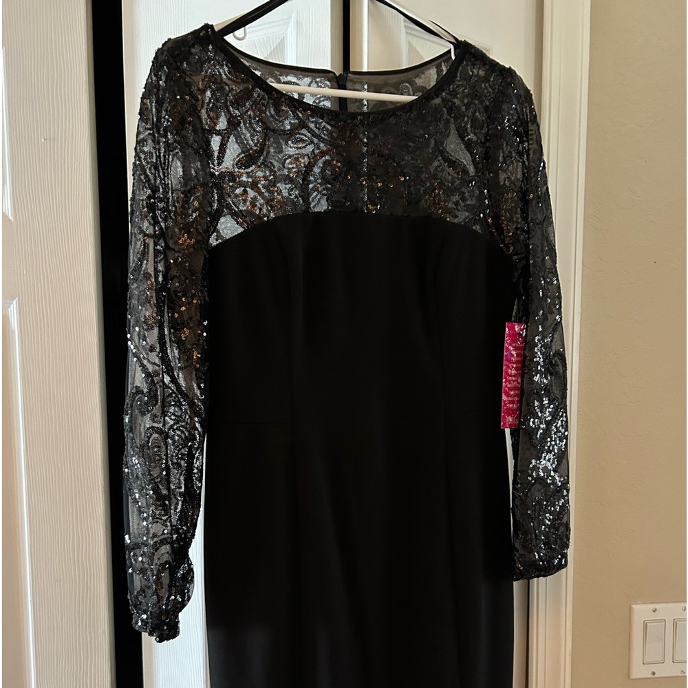 Beautiful black cocktail dress! The last picture is close in design and style.